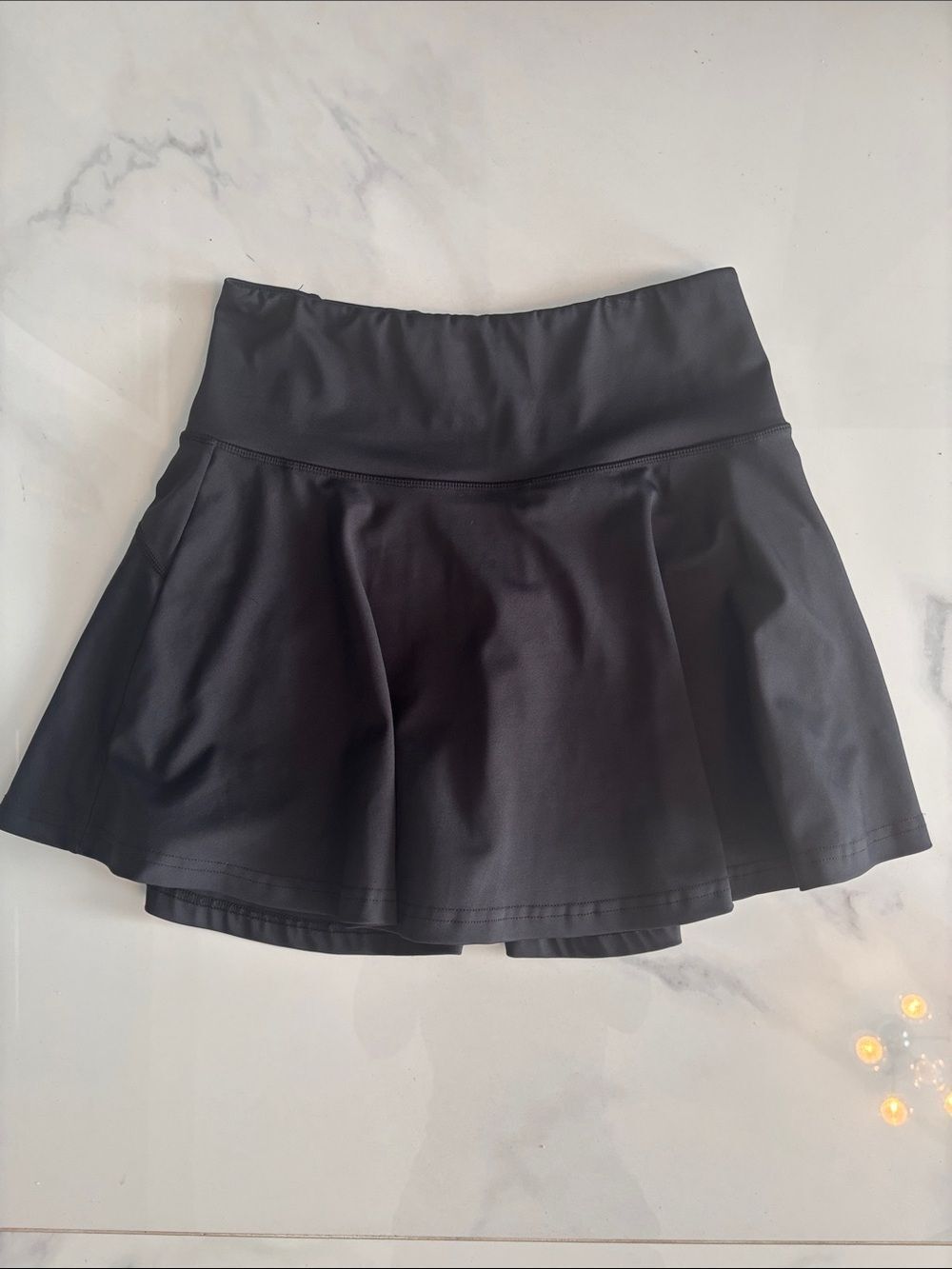 CVG Constantly Varied Gear Black Skort with zipper pocket at back